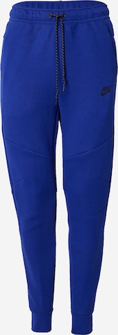 Pantalon 'TCH FLC' Nike Sportswear en bleu : devant