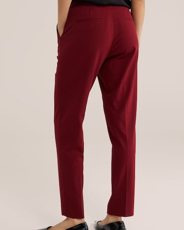 WE Fashion Slimfit Hlače na rob | rdeča barva