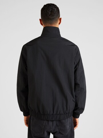 Tommy Jeans Jacke 'ESSENTIAL' in Schwarz