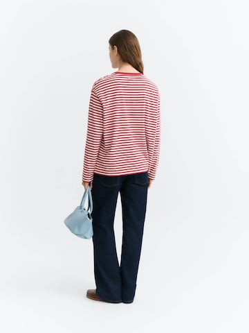 Maglietta di Thinking MU in rosso: dietro