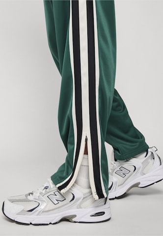 Regular Pantalon de sport Unfair Athletics en vert