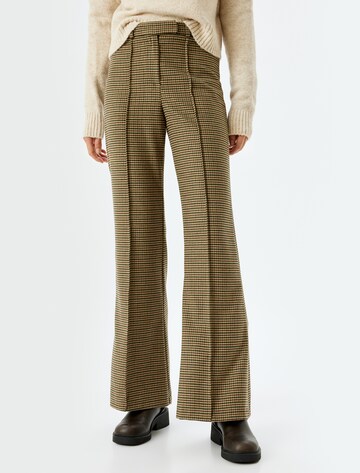 Koton Flared Trousers in Green: front