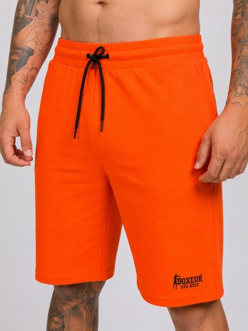 Boxeur des Rues - regular Pantalón deportivo 'Herren Baumwollshorts Boxeur des Rues, Orange, Schwarzes Logo' en naranja
