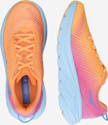 Hoka One One Buty do biegania 'RINCON 3' w kolorze pomarańczowy