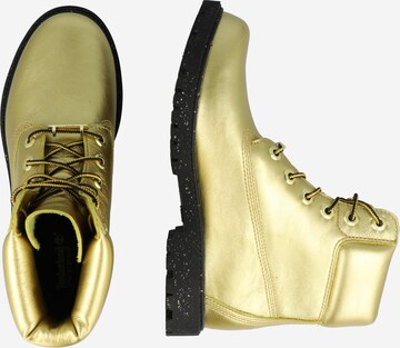 TIMBERLAND Veterlaarsjes in Goud