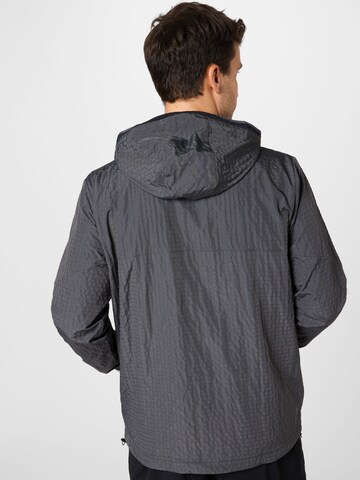 Veste de sport 'Rush' UNDER ARMOUR en gris