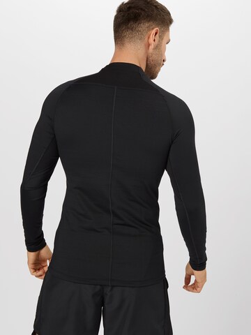 NIKE Regular Fit Funktionsshirt in Schwarz