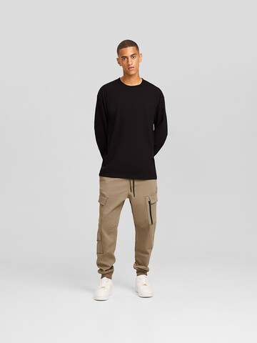 Bershka Tapered Hose in Beige