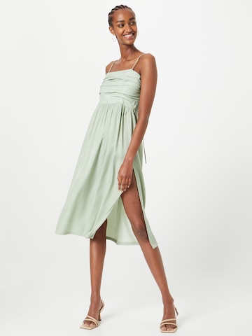 The Frolic Dress in Green: front