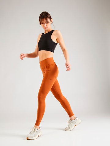 Skinny Pantalon de sport PUMA en marron