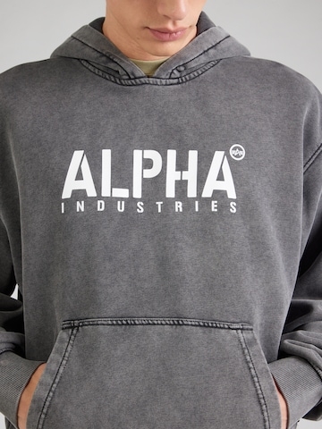 ALPHA INDUSTRIES Sweatshirt 'Stencil' i svart