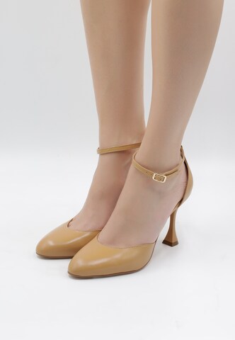 faina Pumps med slynger i beige