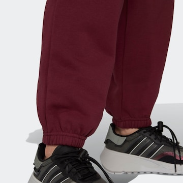 ADIDAS ORIGINALS Tapered Pants ' adicolor Essentials Fleece Jogginghose ' in Red