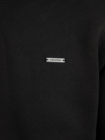 Veste de survêtement Smilodox en noir
