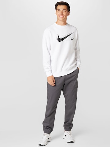 Nike SportswearTapered Hlače - siva boja