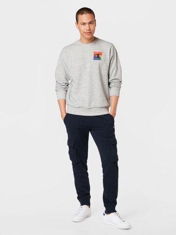 Champion Authentic Athletic Apparel Tapered Sporthose in Blau