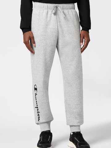Champion Authentic Athletic Apparel Zwężany krój Spodnie w kolorze szary: przód
