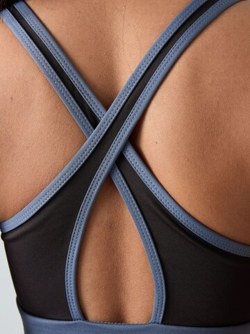 Haut de sport Tommy Life en bleu