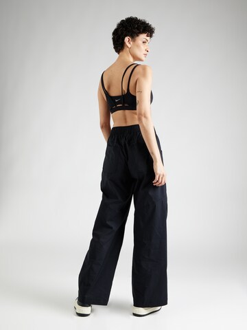 Nike SportswearLoosefit Hlače - crna boja