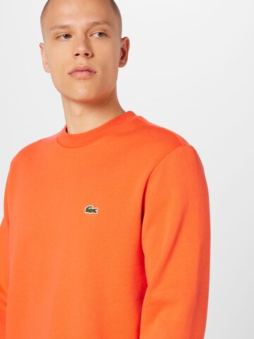 LACOSTESweater majica - narančasta boja