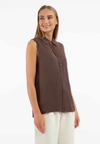 RISA - Blusa en marrón: frente