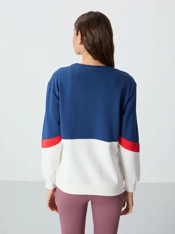 Sweat-shirt Tommy Life en bleu