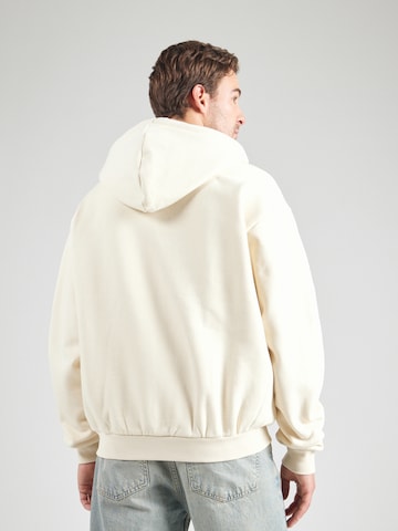 Karl Kani - Sudadera con cremallera en beige