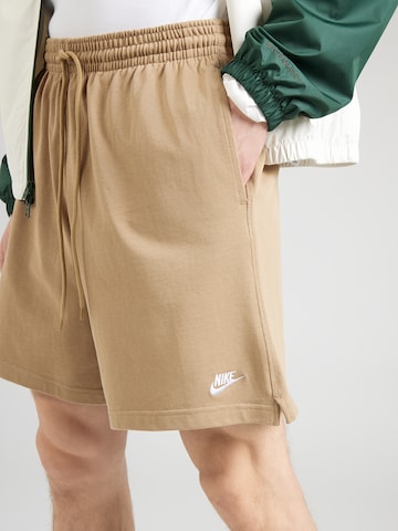 Loosefit Pantalon 'CLUB' Nike Sportswear en beige
