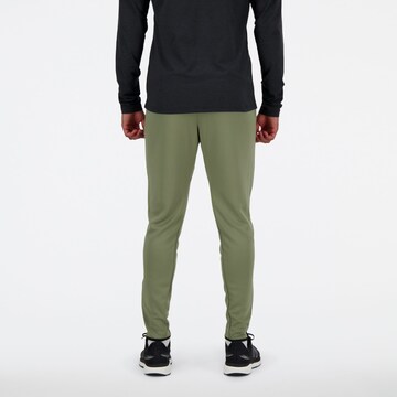 new balance Tapered Sportbroek 'Tenacity' in Groen