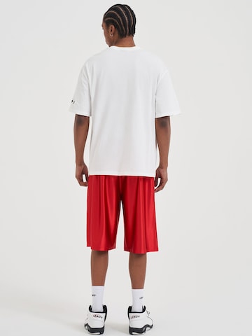 AND1 Loosefit Funkční kalhoty – červená