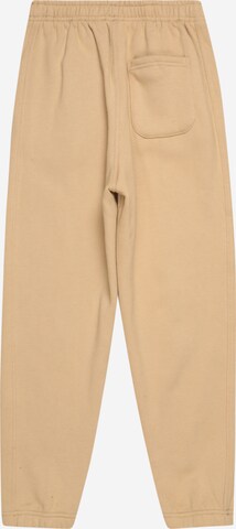 Tapered Pantaloni di Urban Classics in beige