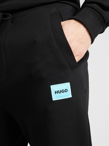 HUGO - Tapered Calças 'Doak' em preto