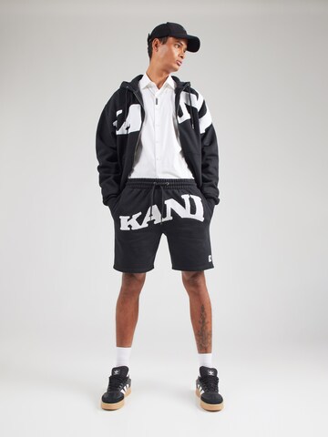 Karl Kani Regular Trousers in Black