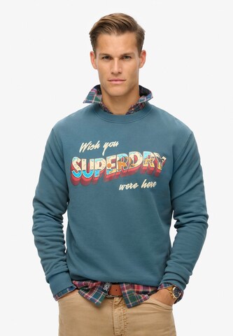 Sweat-shirt Superdry en bleu : devant
