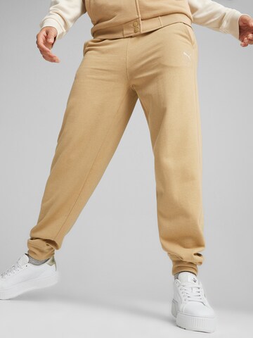 PUMA Tapered Sports trousers 'BETTER SPORTSWEAR' in Brown: front
