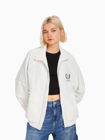 Bershka Between-season jacket in Beige: front