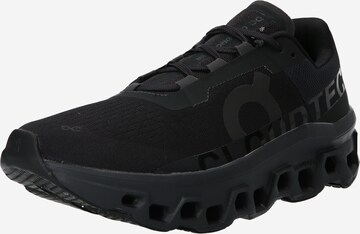 Scarpa da corsa 'Cloudmonster' di On in nero: frontale