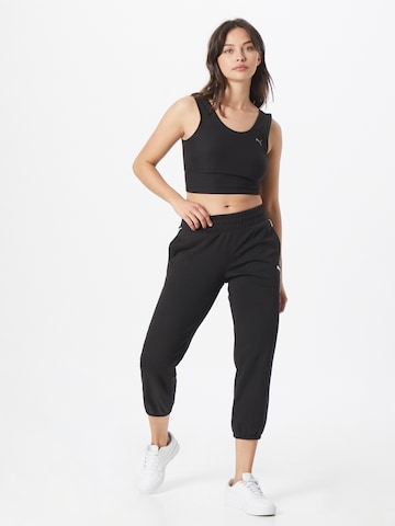 Tapered Pantaloni sportivi di PUMA in nero