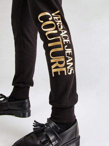 Effilé Pantalon Versace Jeans Couture en noir