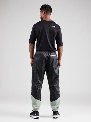 Effilé Pantalon Nike Sportswear en noir