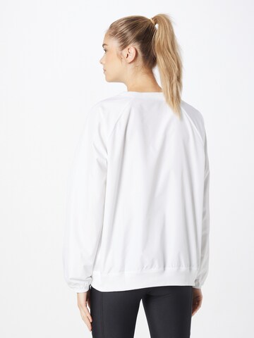 UNDER ARMOUR - Sweatshirt de desporto em branco