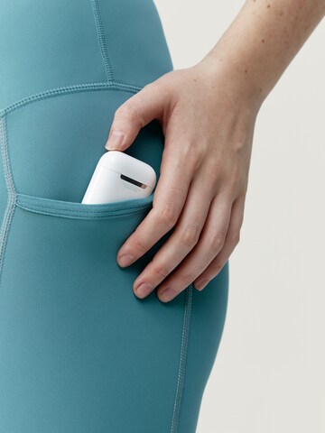 Born Living Yoga Skinny Sportbroek 'Carole' in Blauw