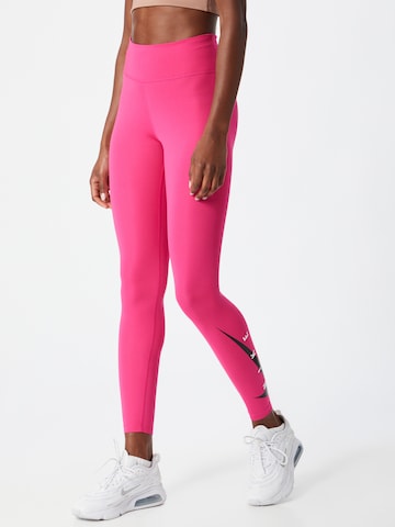 NIKE Skinny Spodnie sportowe w kolorze różowy: przód