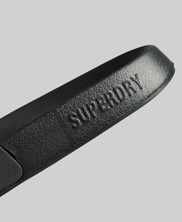 Claquettes / Tongs Superdry en noir