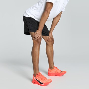 Loosefit Pantalon de sport 'Velocity' PUMA en noir