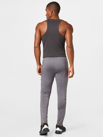 Tapered Pantaloni sportivi di 4F in grigio