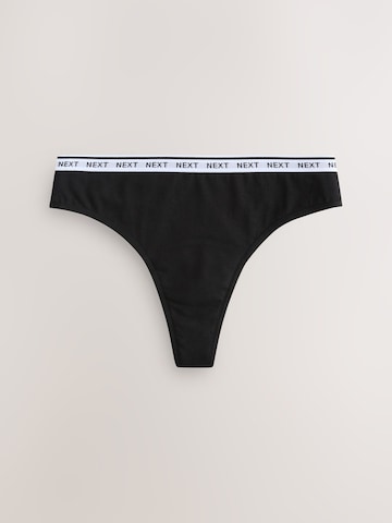 Next Stringid, värv must