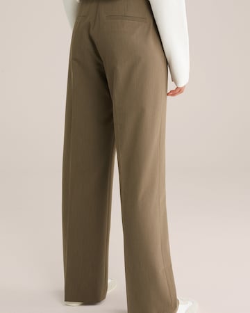 WE Fashion Wide leg Trousers with creases in Brown