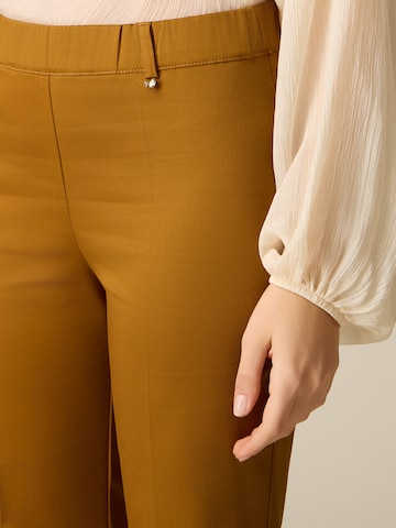 Tapered Pantaloni di oltre in marrone