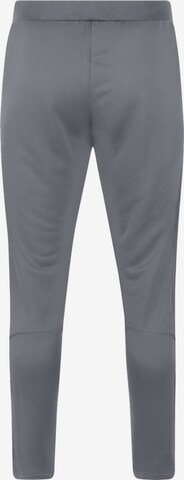 Slimfit Pantaloni sportivi di JAKO in grigio